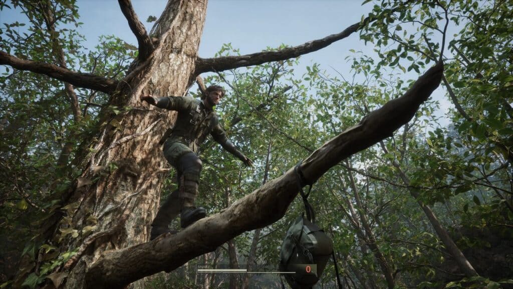 A soldier, reminiscent of Metal Gear Solid Delta Snake Eater, balances on a tree branch in a dense forest, with a bag hanging from a lower branch.
