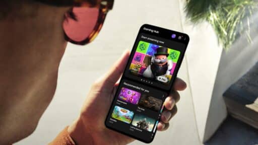 A person holding a smartphone displays a gaming hub app with game options, highlighting Samsung mobile cloud gaming in Europe.