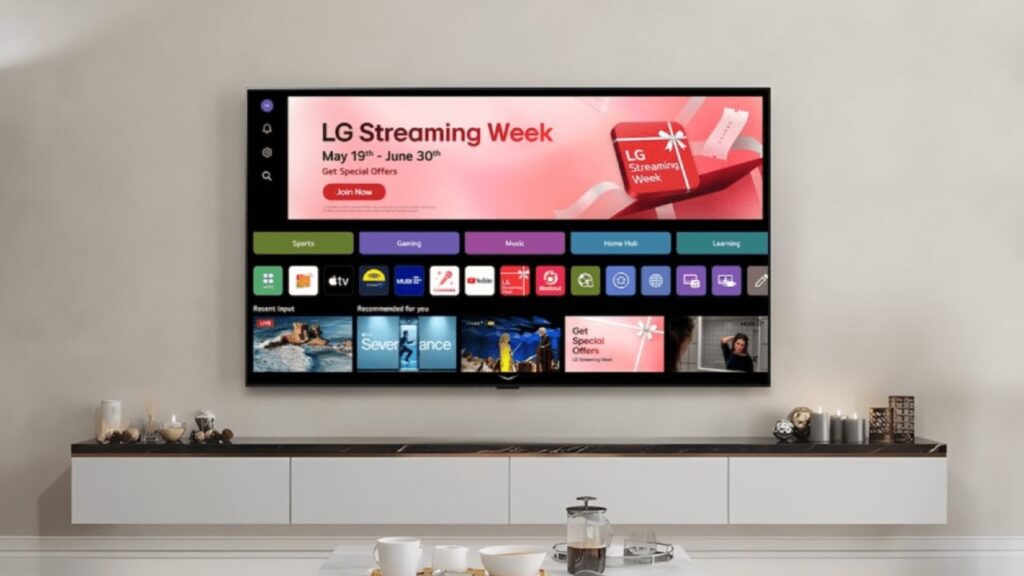 A wall-mounted TV displays the LG Streaming Week promotion, featuring Blacknut smart TV cloud gaming, above a modern white shelf with decor items.