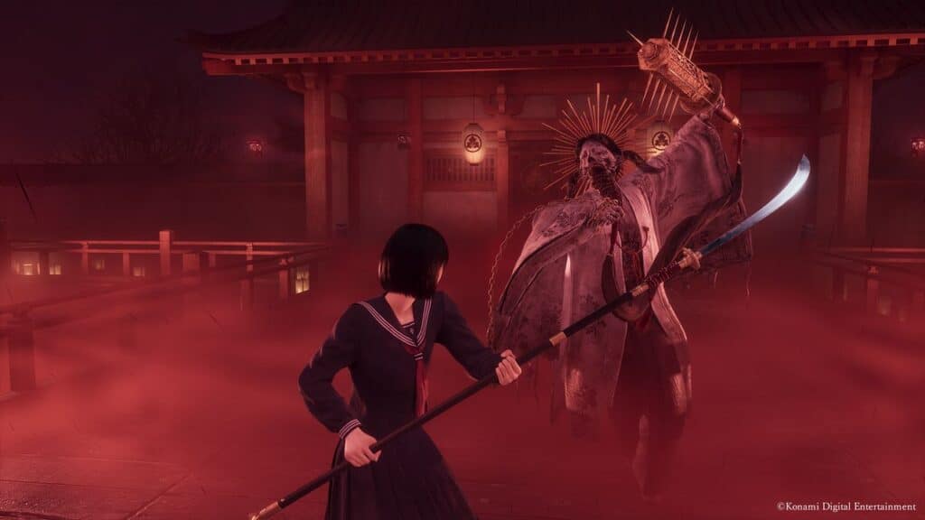 A schoolgirl with a polearm faces a menacing, armored figure in a red, misty courtyard at night, evoking the haunting atmosphere of Silent Hill f.