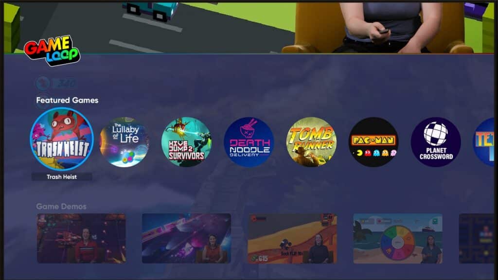 A video game menu screen on GAMELOOP Smart TV cloud gaming showcases featured titles, including Trash Heist, Lullaby of Life, and more.