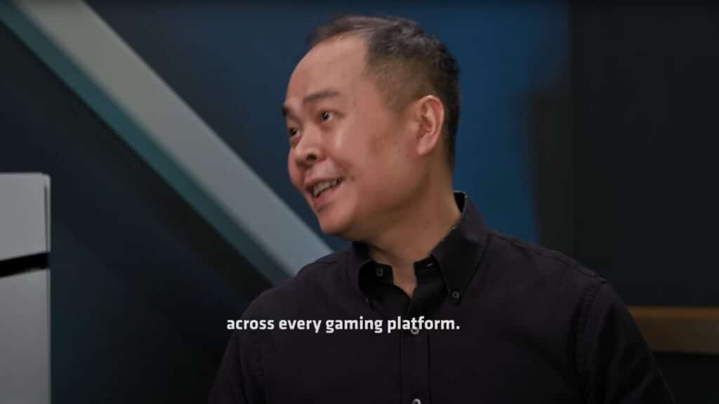 A smiling man in a black shirt speaks, with the text "across every gaming platform." displayed, highlighting the versatility of Project Amethyst.