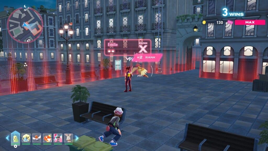A player sneaks behind benches in a city plaza; another character, from Pokémon Legends Z-A, stands inside a red-lit barrier ahead.