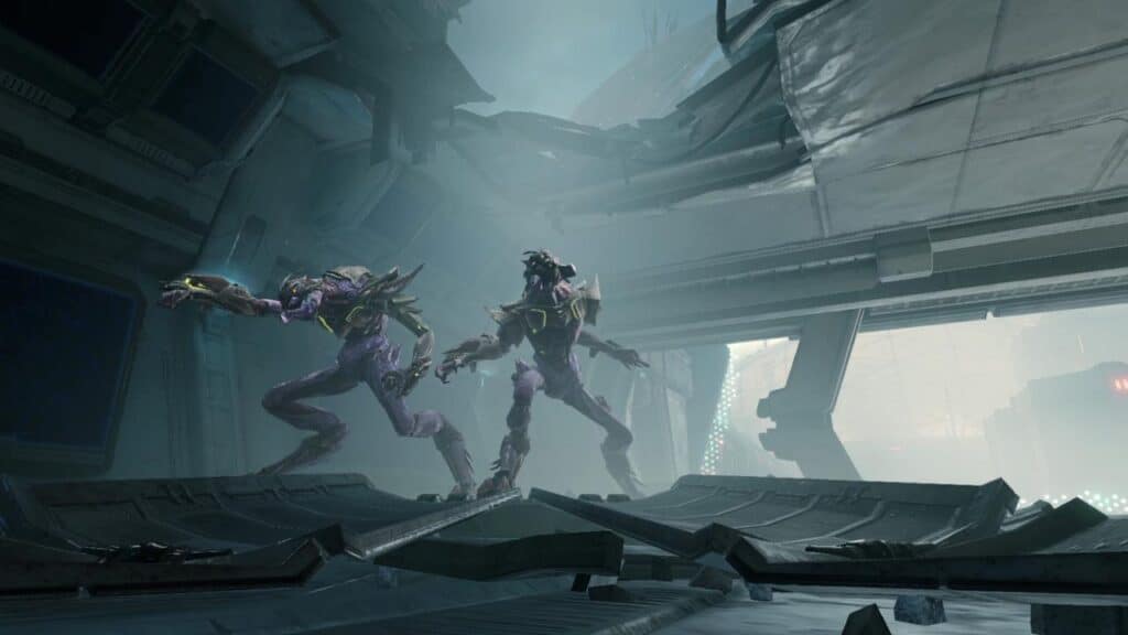 Two alien creatures with armor stand in a damaged, futuristic metallic structure with a hazy blue light, evoking the otherworldly atmosphere of Metroid Prime 4: Beyond.