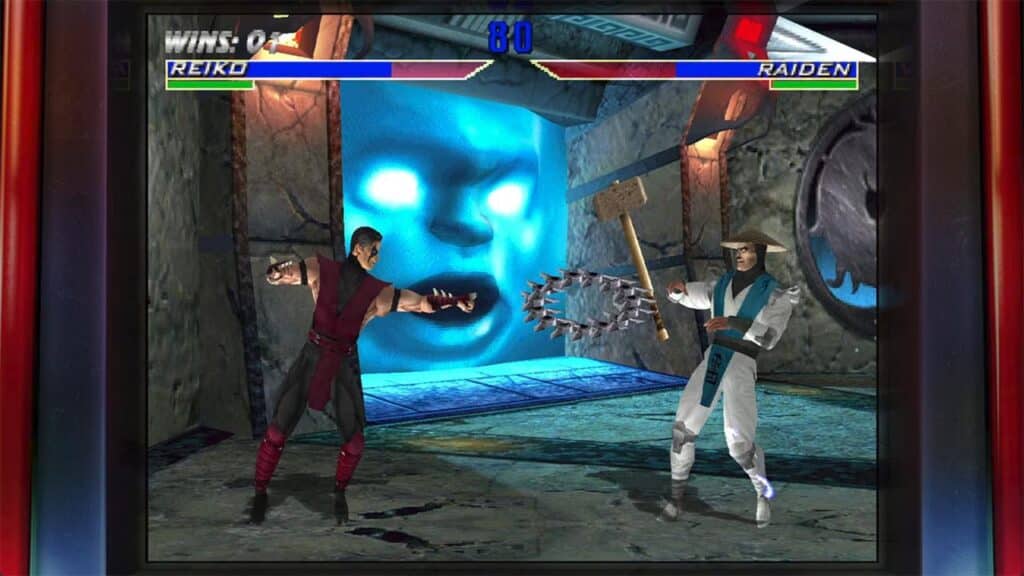 Two fighters, Reiko and Raiden, face off in a fantasy arena with a glowing blue face in the background, capturing the intense atmosphere of Mortal Kombat: Legacy Kollection.