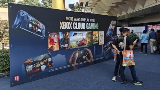 Xbox Cloud Gaming booth at Comic Con India showing device-agnostic play across phones, handhelds, and controllers
