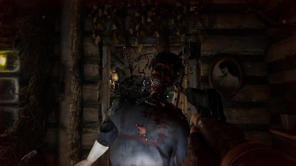 A person is shooting a zombie-like creature in Ebola Village.