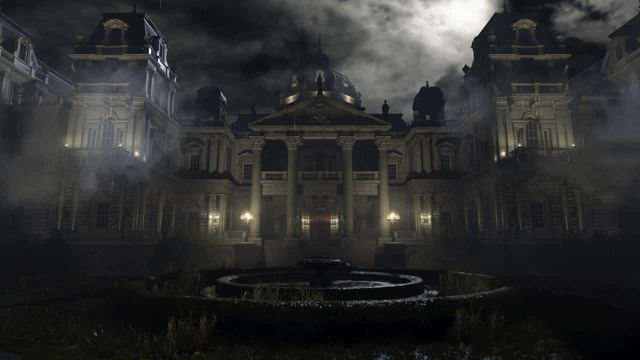 A large, dark, eerie mansion at night with a lit fountain and mist in front under a cloudy moonlit sky—like a scene from the Resident Evil Requiem preview.