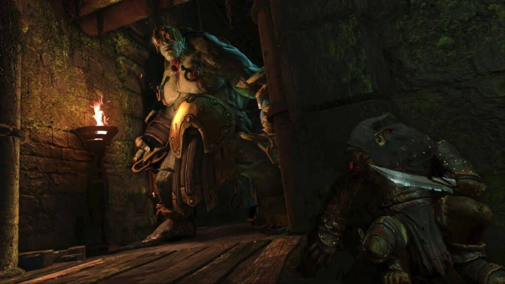 A giant armored creature enters a dim, mossy dungeon while a hooded figure hides in the shadows with a dagger in Styx: Master of Shadows.