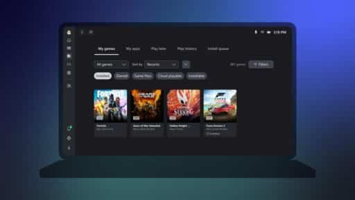 A laptop screen displays a gaming library with game covers and filter options on a dark interface.