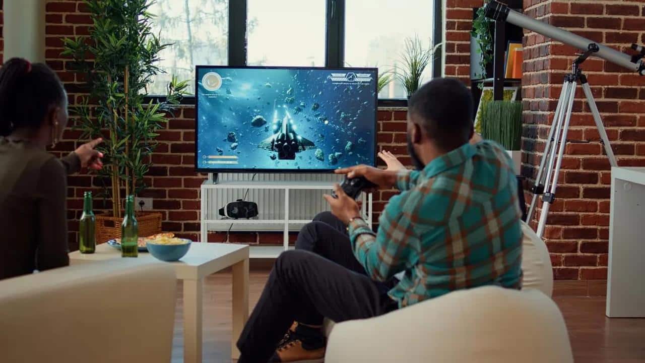 People playing a cloud game on a smart TV in a living room without a console