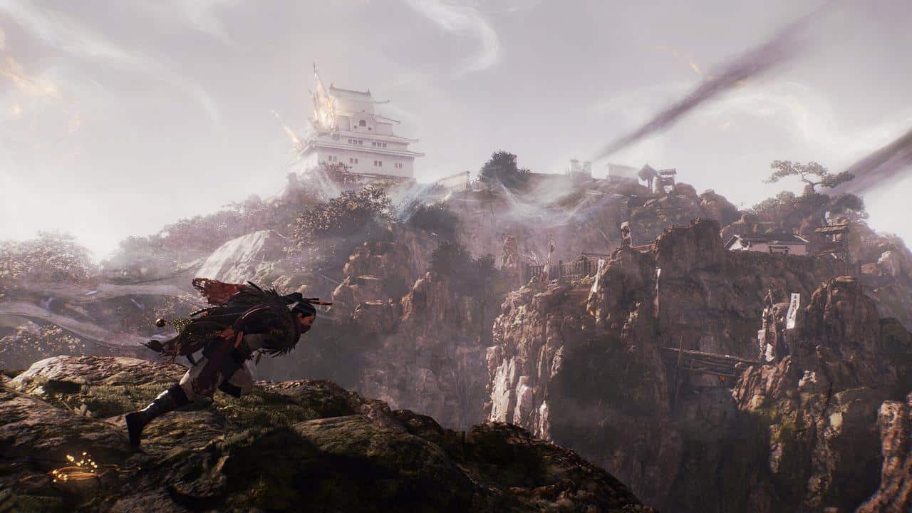 A warrior crouches on a rocky cliff, looking toward a distant fortress atop a misty mountain.