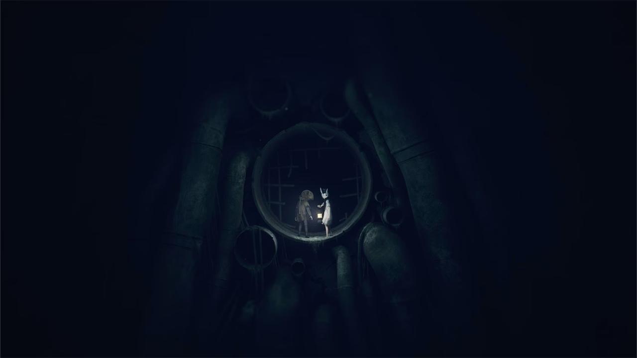 Two small Reanimal characters stand inside a large dark pipe, surrounded by shadows and dimly lit by a soft light.