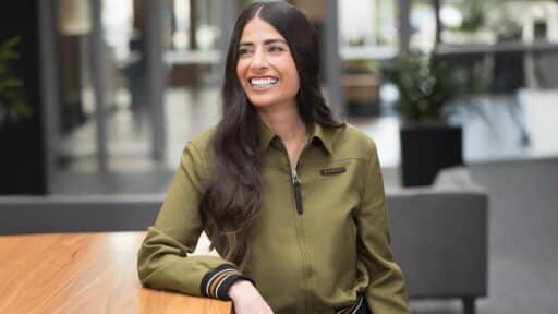 Asha Sharma, the new CEO of Microsoft Gaming, smiling in an office setting