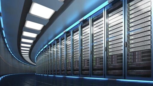 Long row of server racks in a modern data centre, representing cloud hosting infrastructure for online multiplayer and cloud gaming.