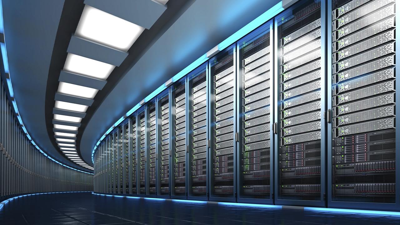 Long row of server racks in a modern data centre, representing cloud hosting infrastructure for online multiplayer and cloud gaming.