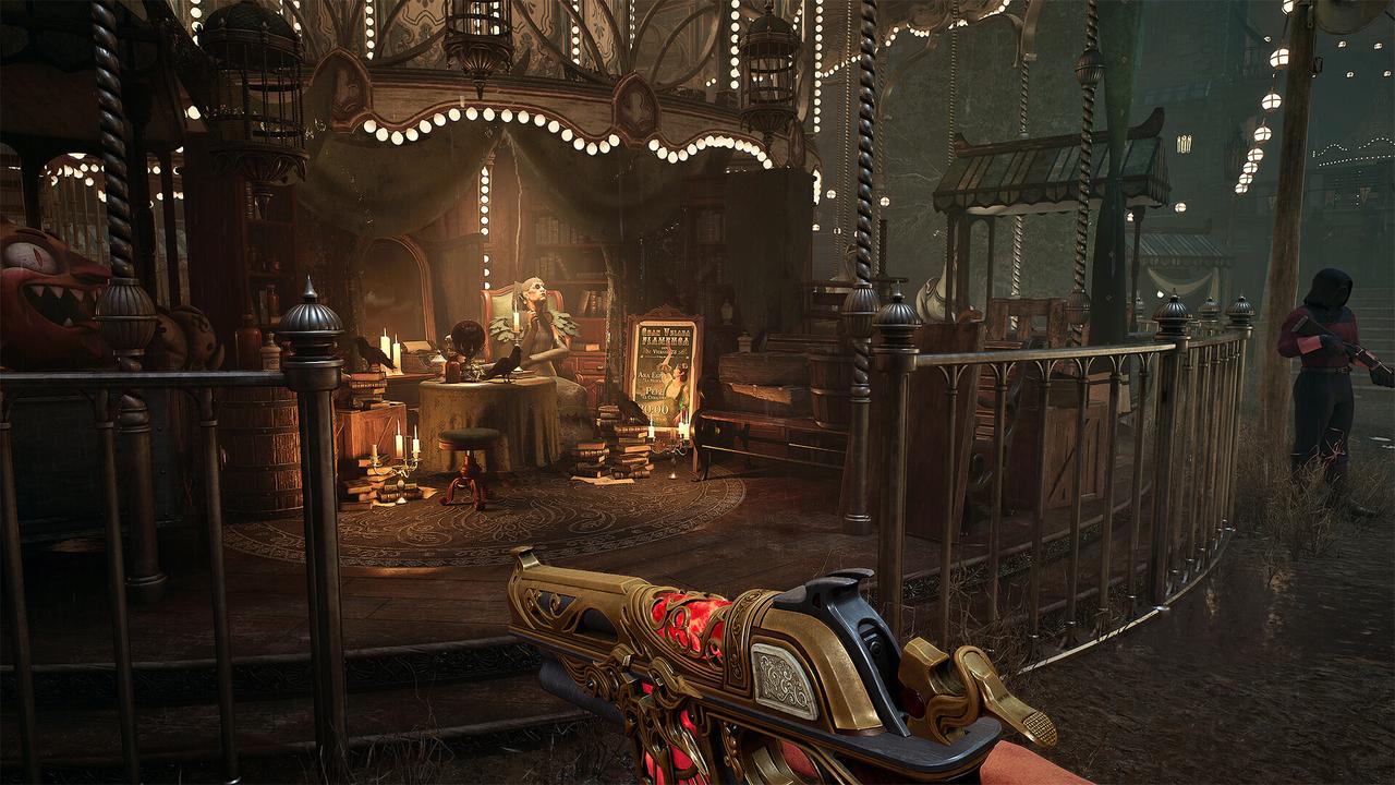 First-person view of the Tormentosa fairground hub in Crisol: Theater of Idols, with La Planidera’s candlelit stall and an ornate blood-powered gun.