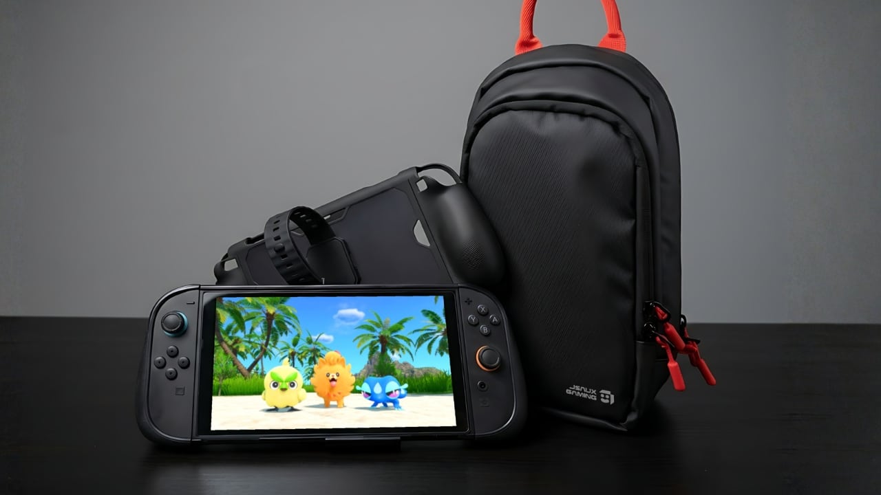 A handheld gaming console with a game displayed, VR headset, smartwatch, and black bag on a dark table—perfect for those interested in accessories featured in the latest Jsaux Switch 2 review.