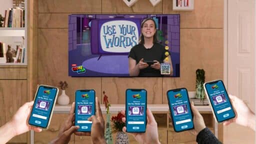 GAMELOOP LIVE! on a Samsung TV with multiple players joining from their phones during a live play-along event.