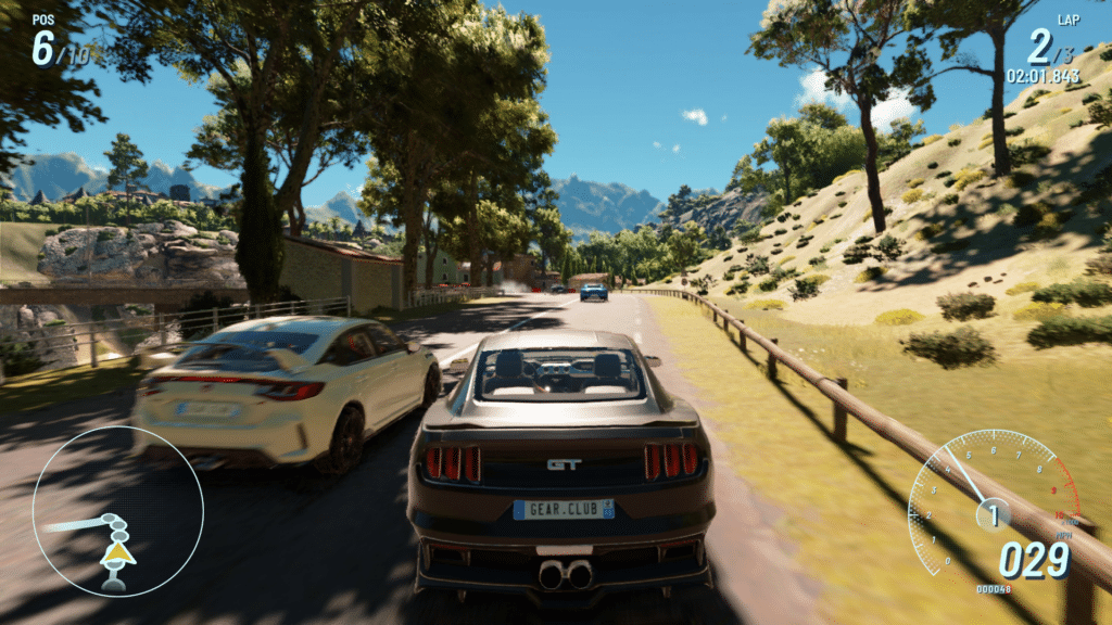 A racing game scene featuring two cars, a white vehicle and a black sports car, driving along a scenic road surrounded by trees and mountains. The interface displays position, lap time, and speed.