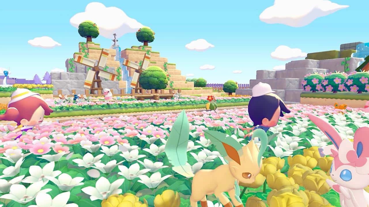 Two characters walking through a colourful flower field with Leafeon and Sylveon in the foreground in Pokémon Pokopia.