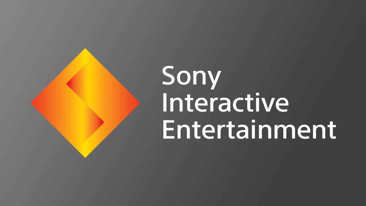 Sony Interactive Entertainment logo with an orange-yellow diamond on a dark gray background.