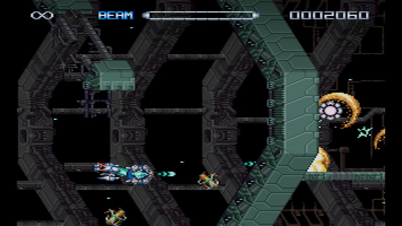 R-Type Dimensions III in the original 1993 2D pixel art mode, demonstrating the visual hot-swap feature.