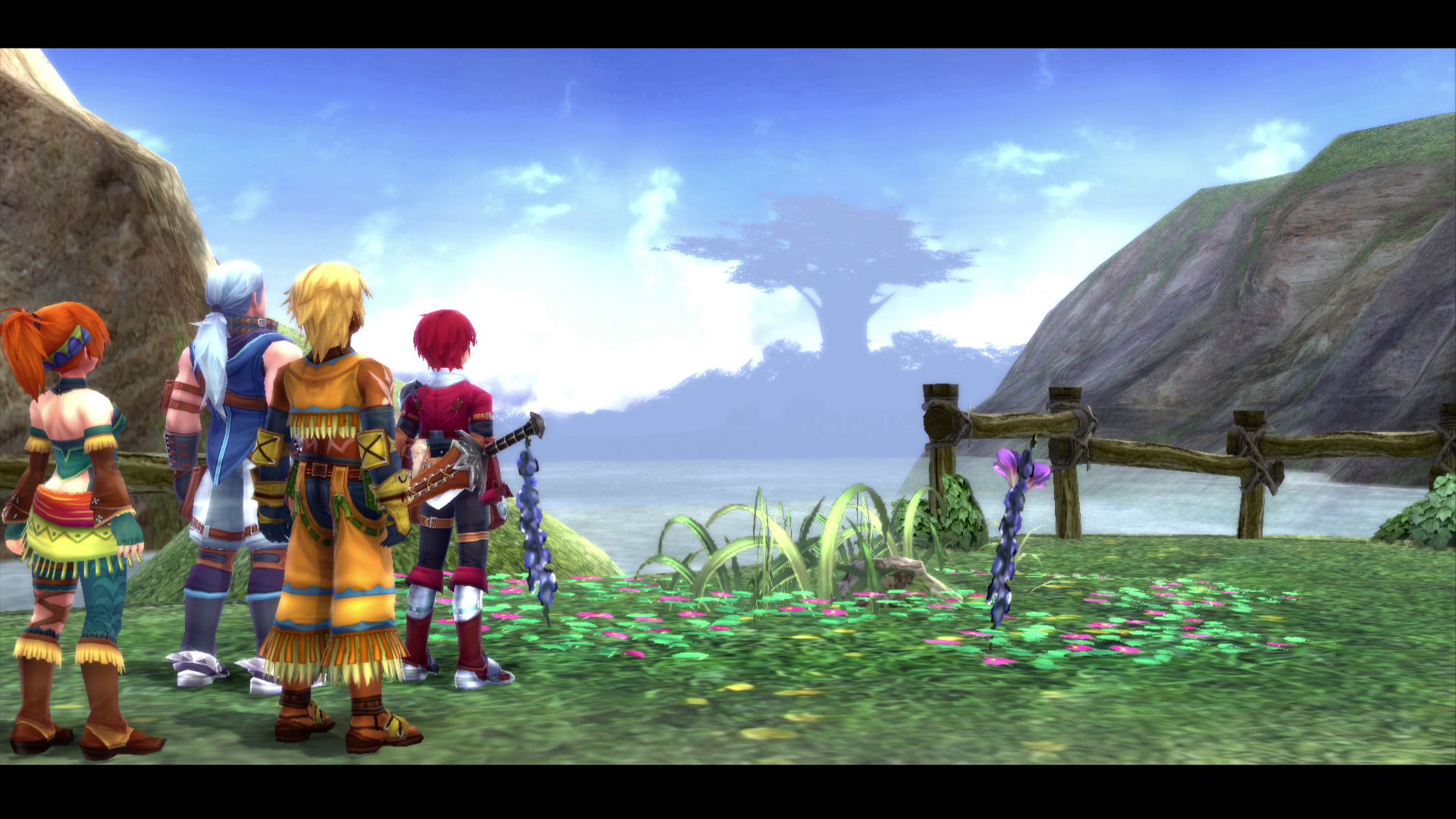 YsMemoireRevelationsInCelceta_Screenshot_Story_04 Four characters standing on grassy ground looking at a large tree in the distance across a body of water with mountains on the right