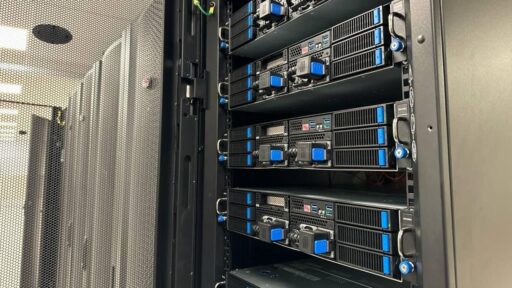 Server racks inside a data centre representing Boosteroid and DL Invest Group’s 300MW AI infrastructure plan.