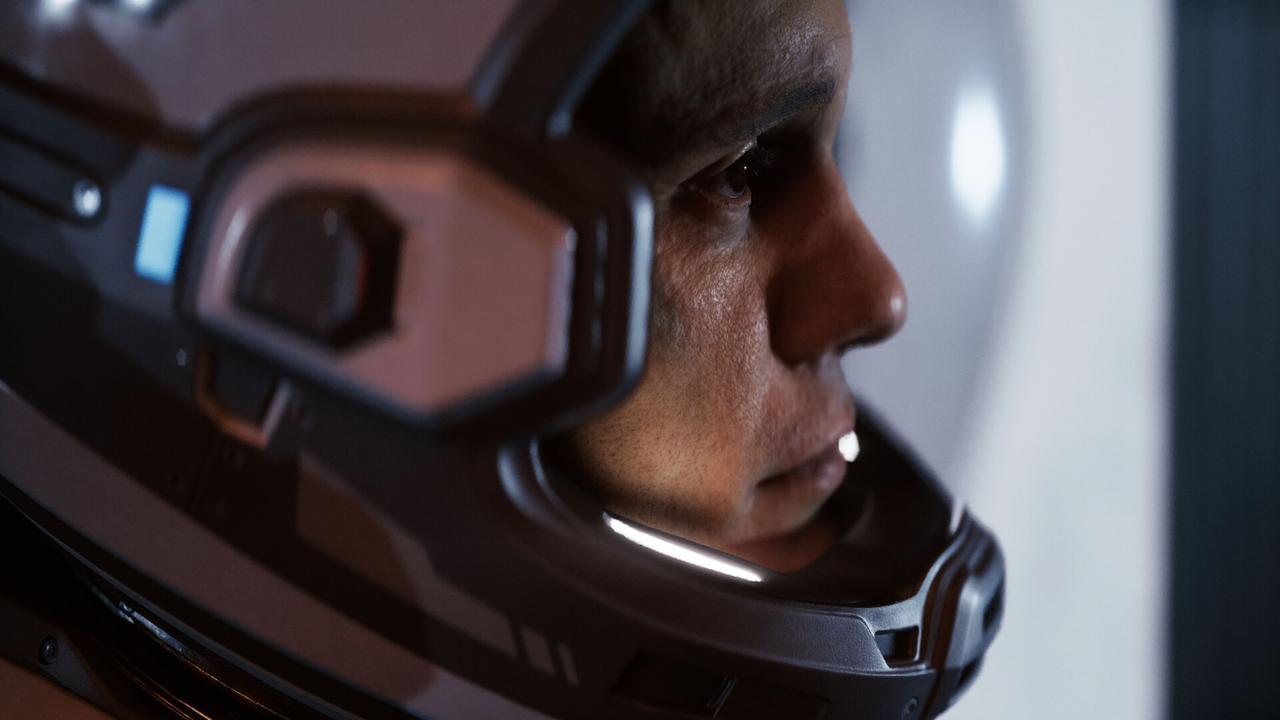A close-up profile of a Cassiopeia crew member wearing a space helmet, highlighting the detailed Unreal Engine 5 graphics in Directive 8020.