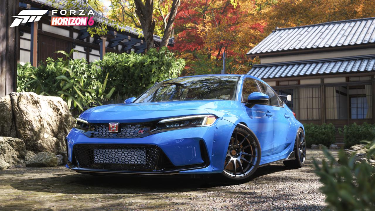 A customized blue Honda Civic Type R with a widebody kit parked in front of a traditional Japanese estate in Forza Horizon 6.