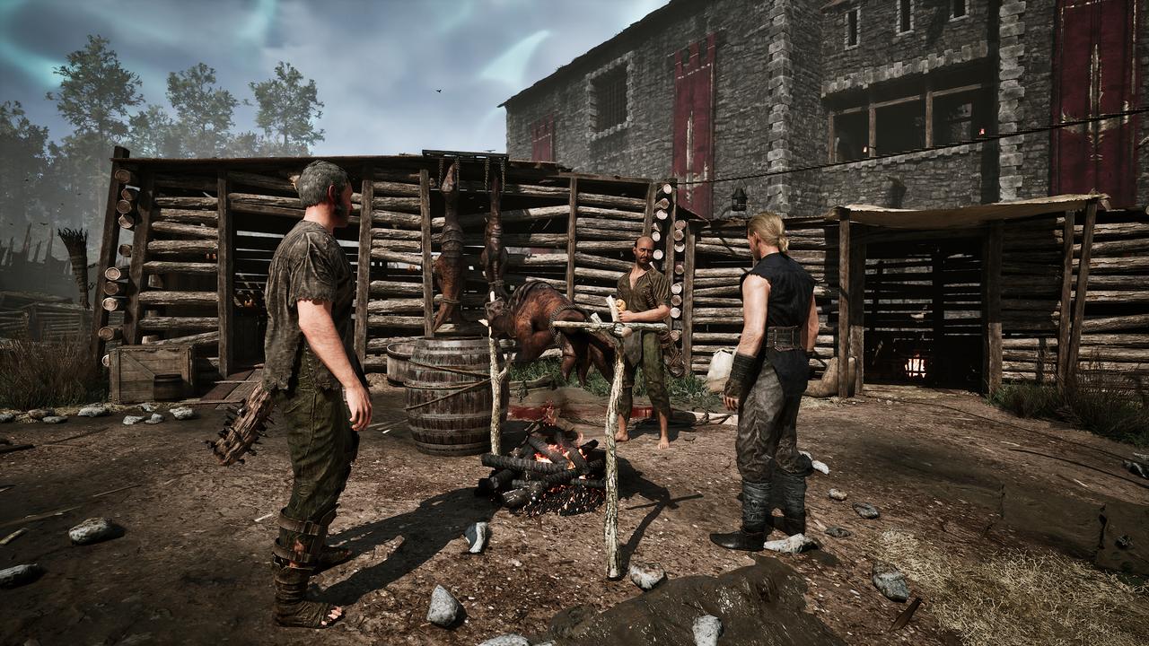 Gothic 1 Remake screenshot showing characters gathered around a camp area inside The Colony.