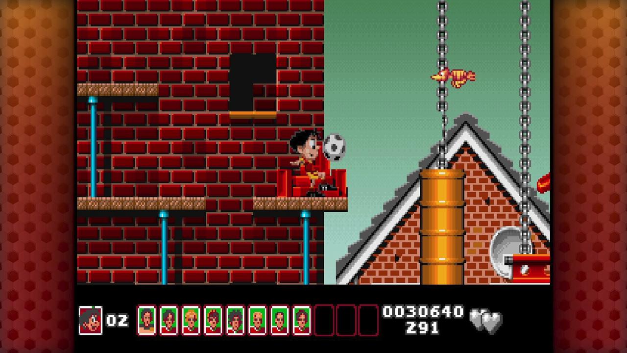 Soccer Kid stands on a platform with a soccer ball beside brick buildings and hanging chains in Soccer Kid Collection, with collected football cards shown in the HUD.