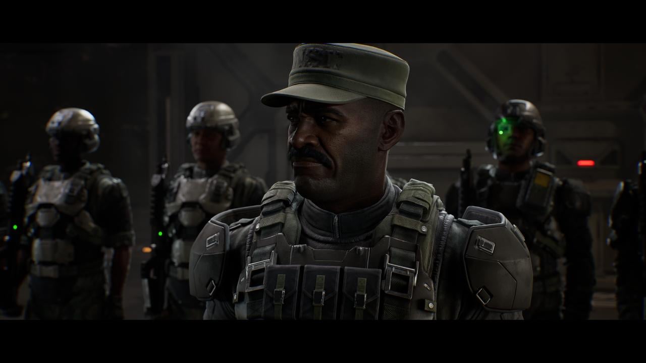 Sgt. Major Avery Johnson stands with UNSC soldiers in Halo: Campaign Evolved.
