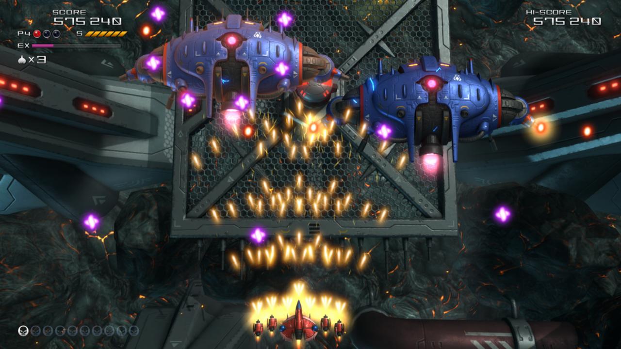 Javelion firing at enemies while navigating incoming projectiles in Truxton Extreme.